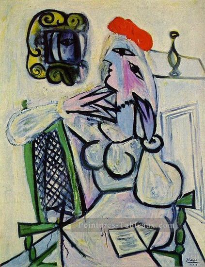 Femme assise au chapeau rouge 1934 Cubisme Peintures à l'huile